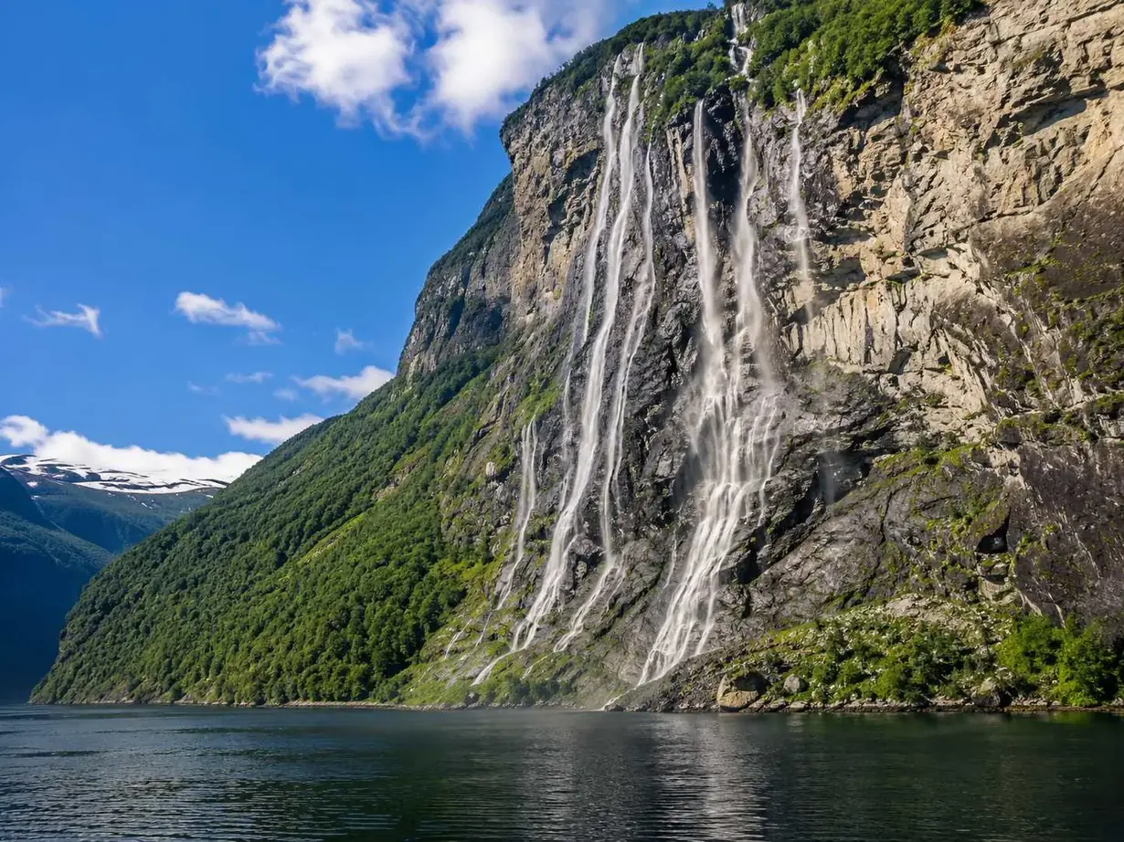 The Seven Sisters waterfall falling into the Geirangerfjord